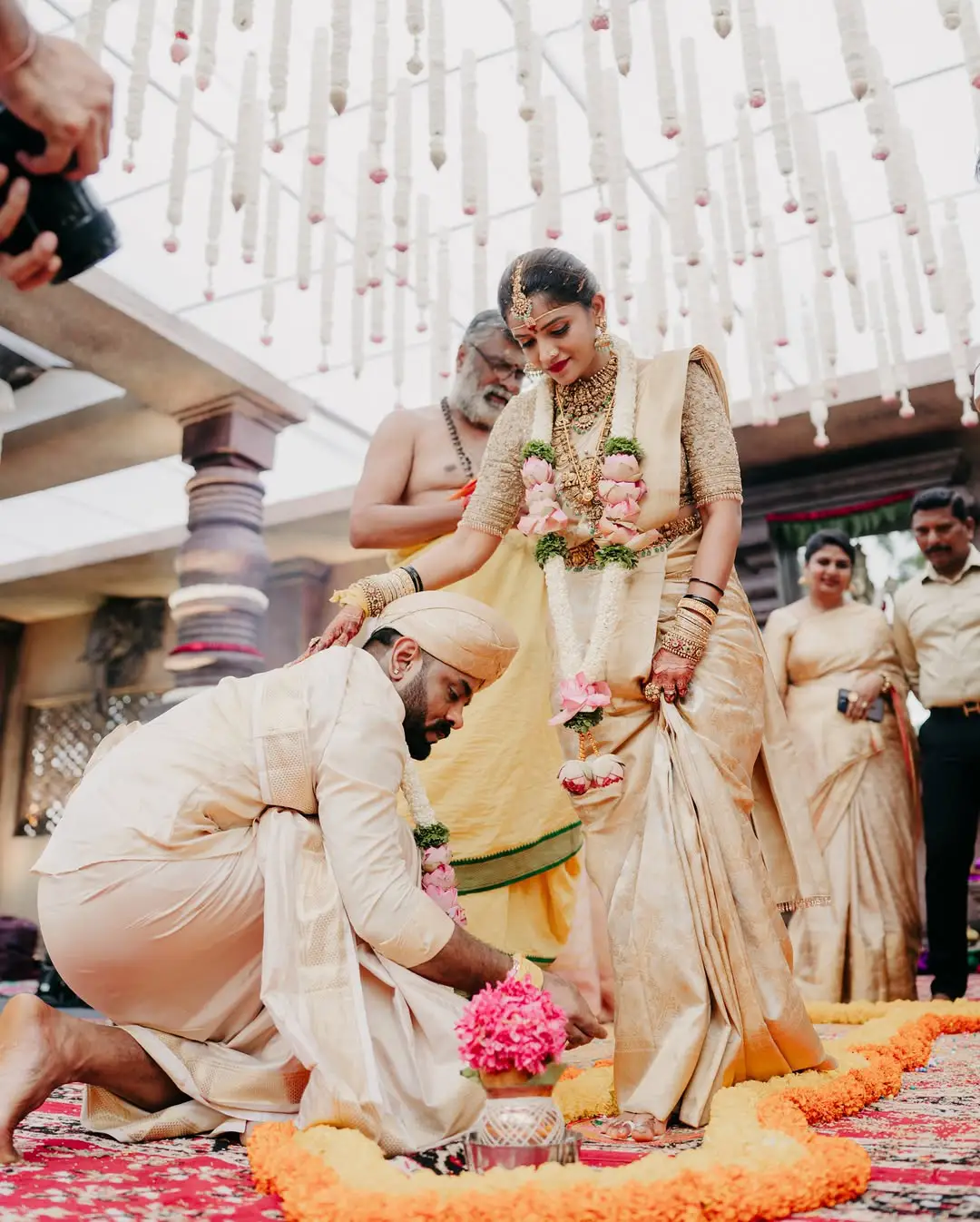 Cameraman Bhuvan Gowda wedding photos are going viral on social media.
