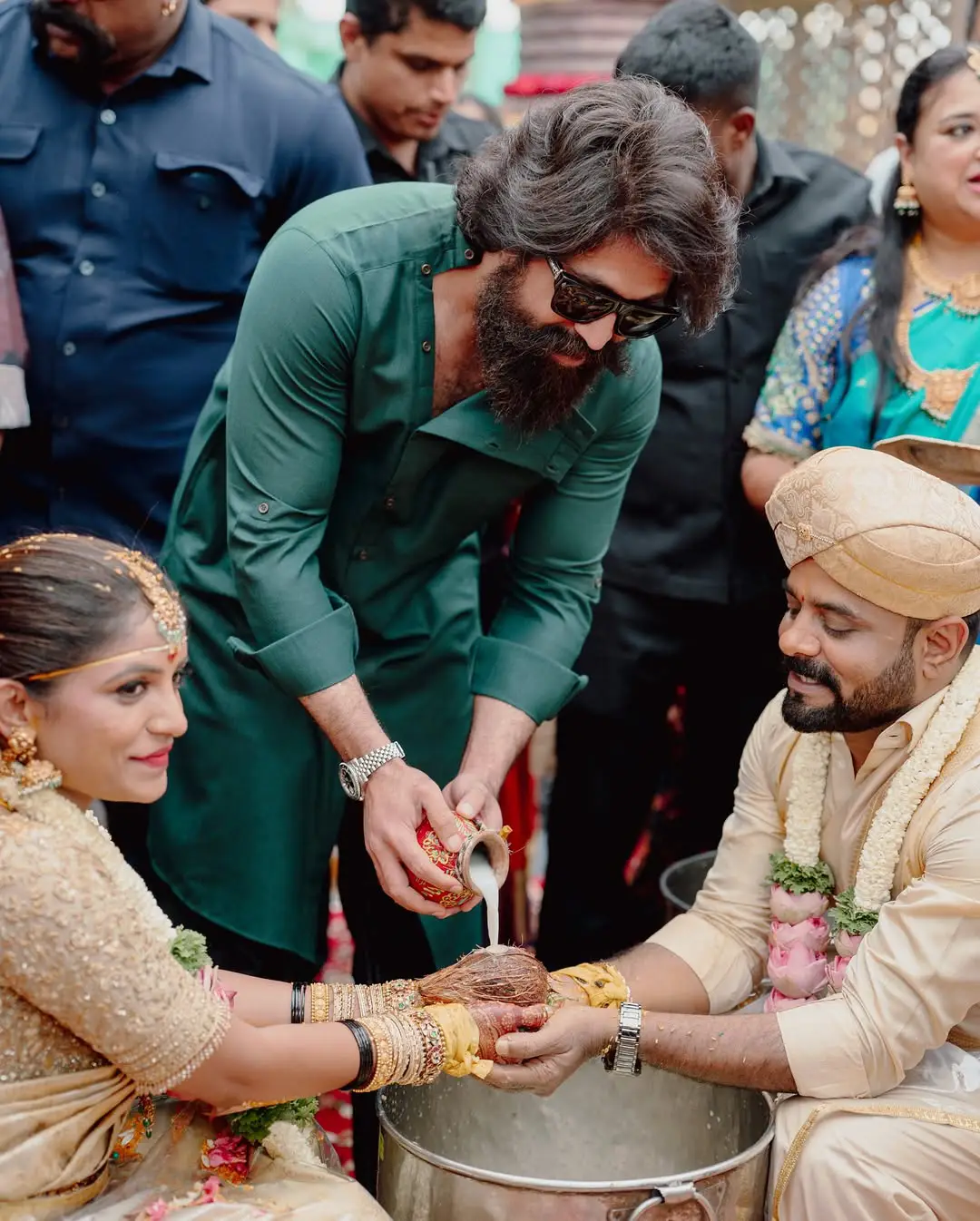 Cameraman Bhuvan Gowda wedding photos are going viral on social media.