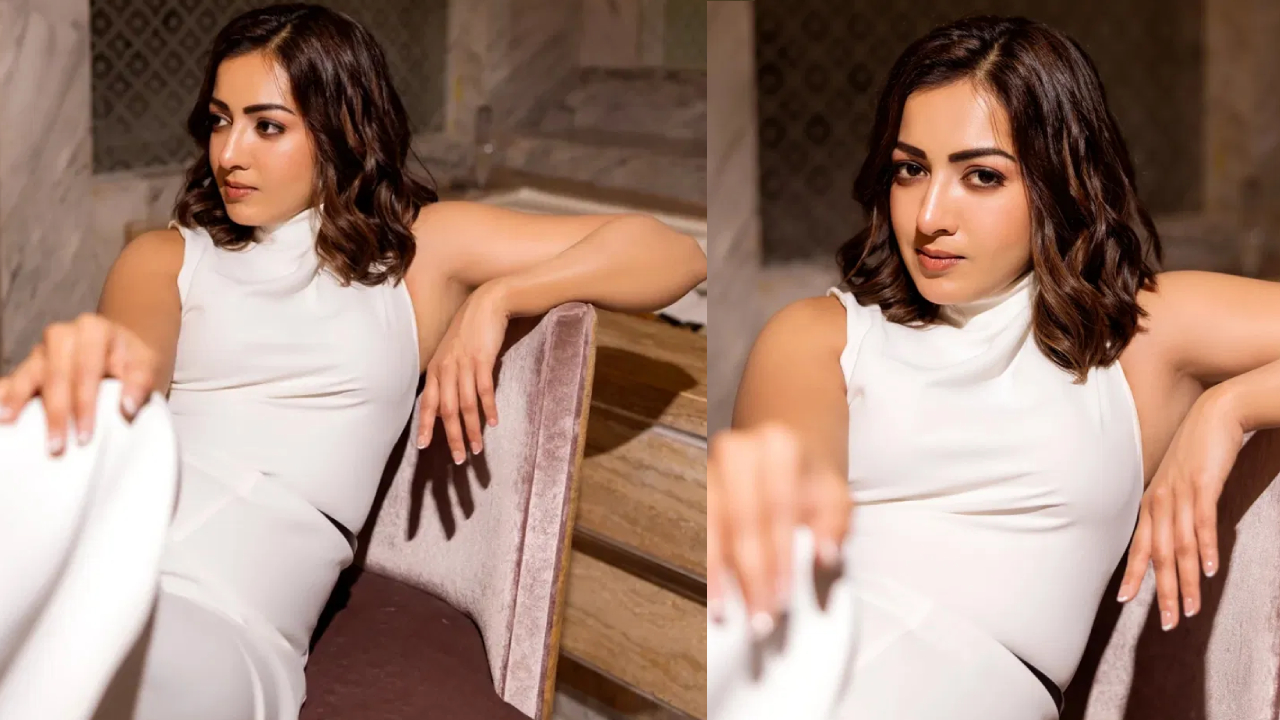 Catherine Tresa: కేక పెట్టిస్తున్న కేథరిన్.. వైట్ డ్రెస్ లో హాట్ పోజులు..