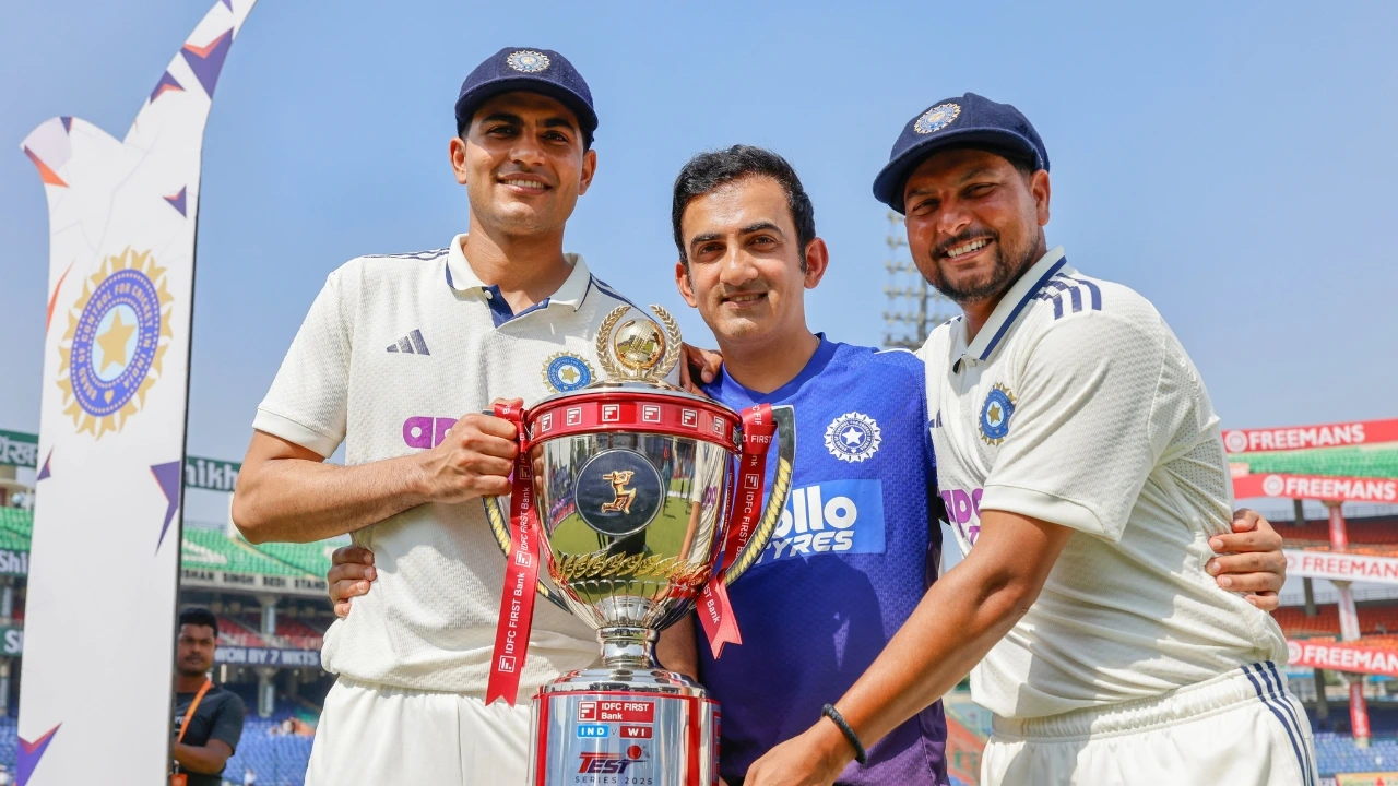 Gill Gambhir Kuldeep with Ind Vs WI Test Series Trophy