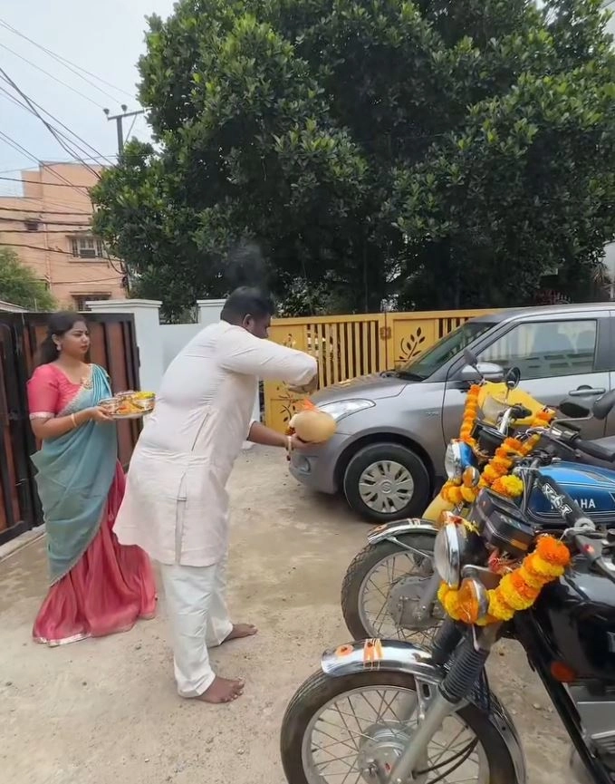 Comedian Viva Harsha Dasara Special Pooja To Vehicles with Wife