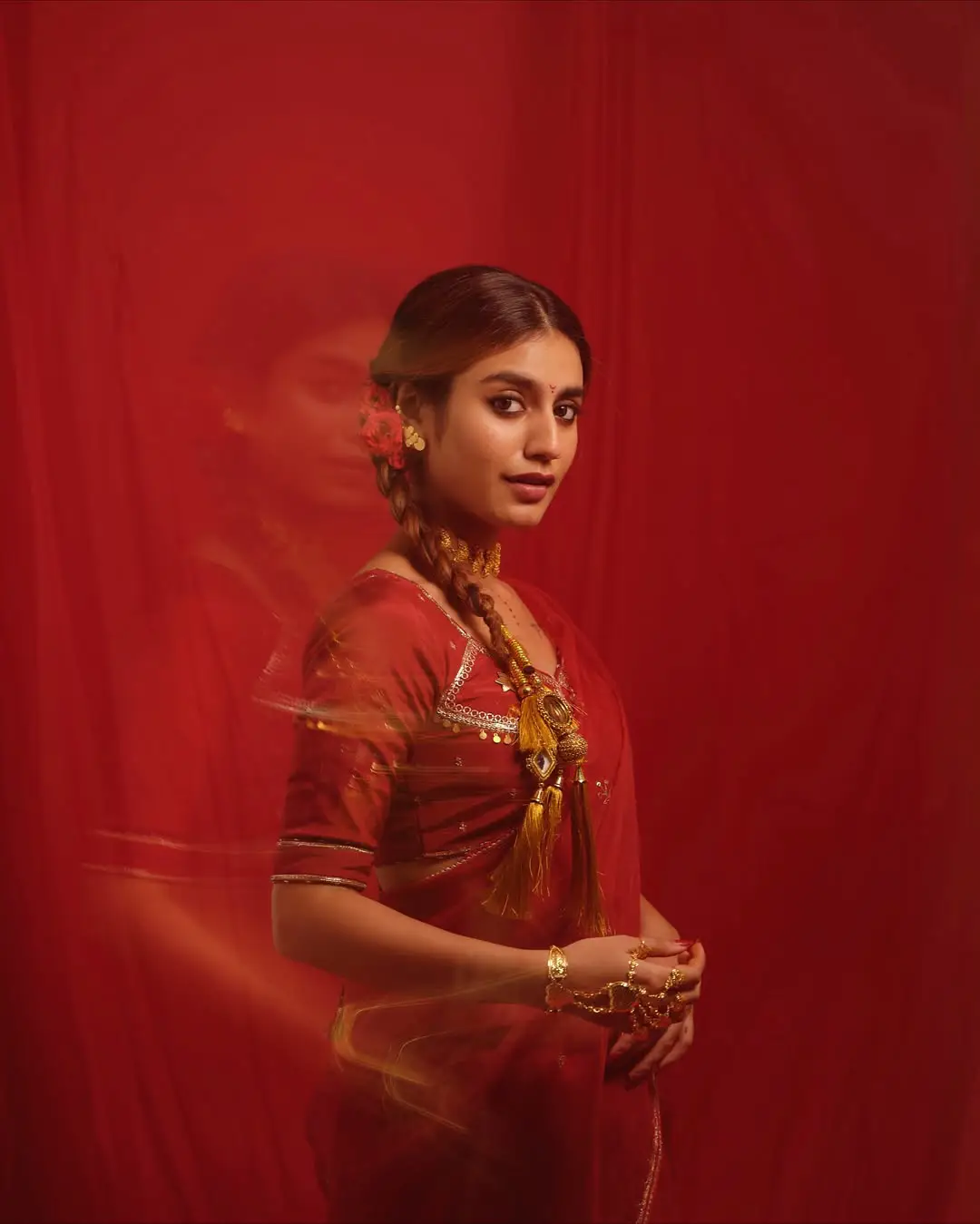 Priya Prakash Varrier latest photoshoot in a red saree