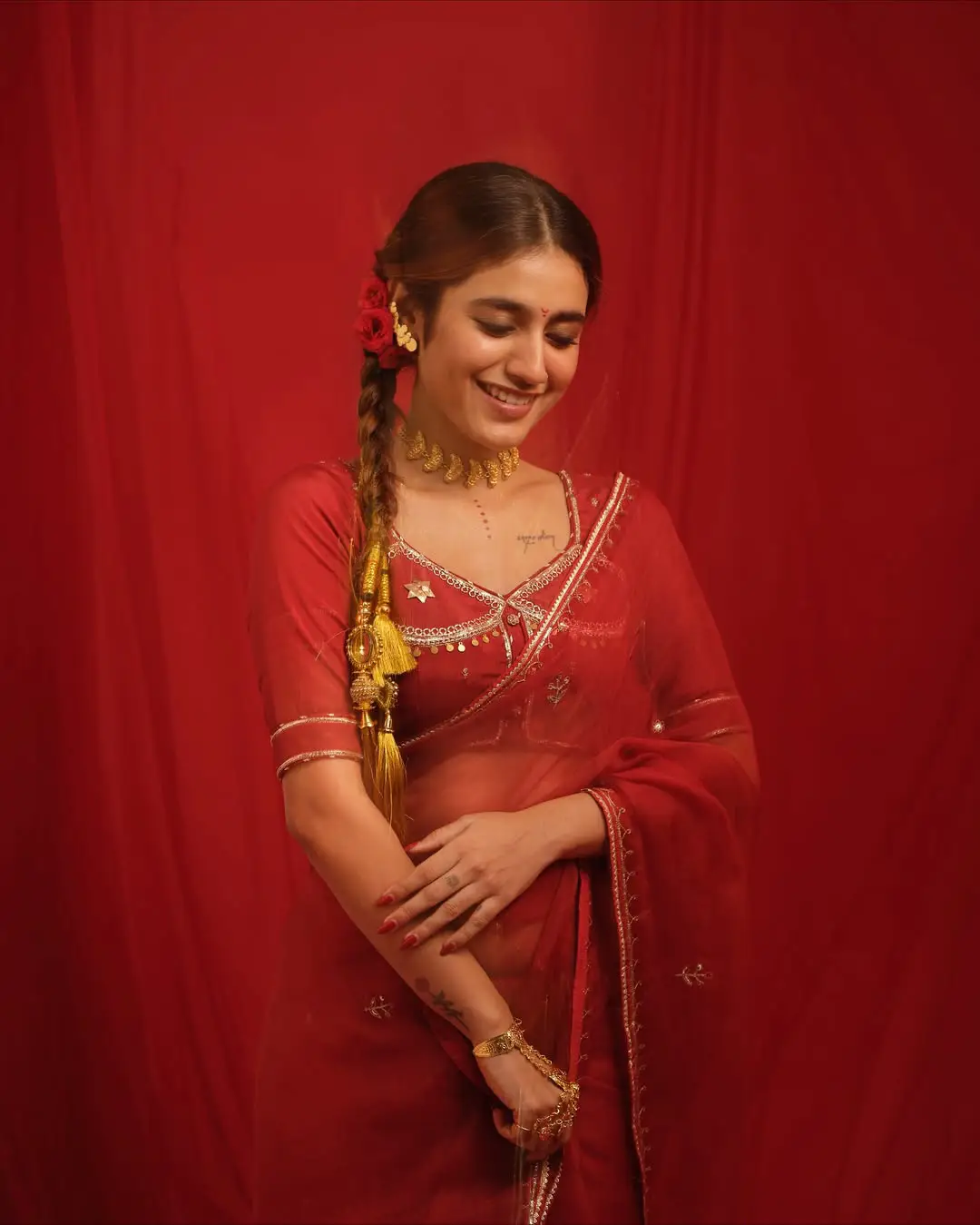 Priya Prakash Varrier latest photoshoot in a red saree