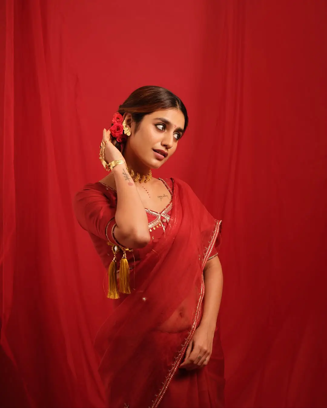 Priya Prakash Varrier latest photoshoot in a red saree