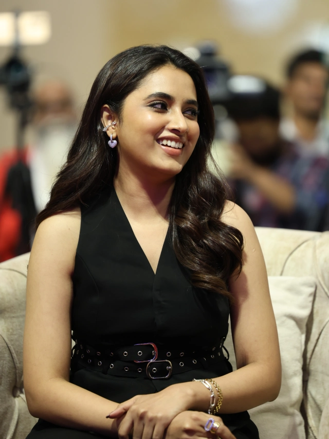 Priyanka Mohan Cute Looks in Black Dress at OG Success Meet