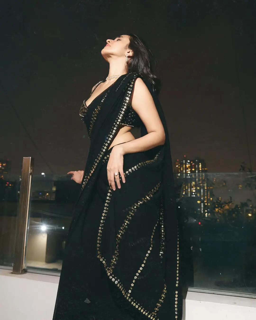Nuveksha glamour show in a black saree