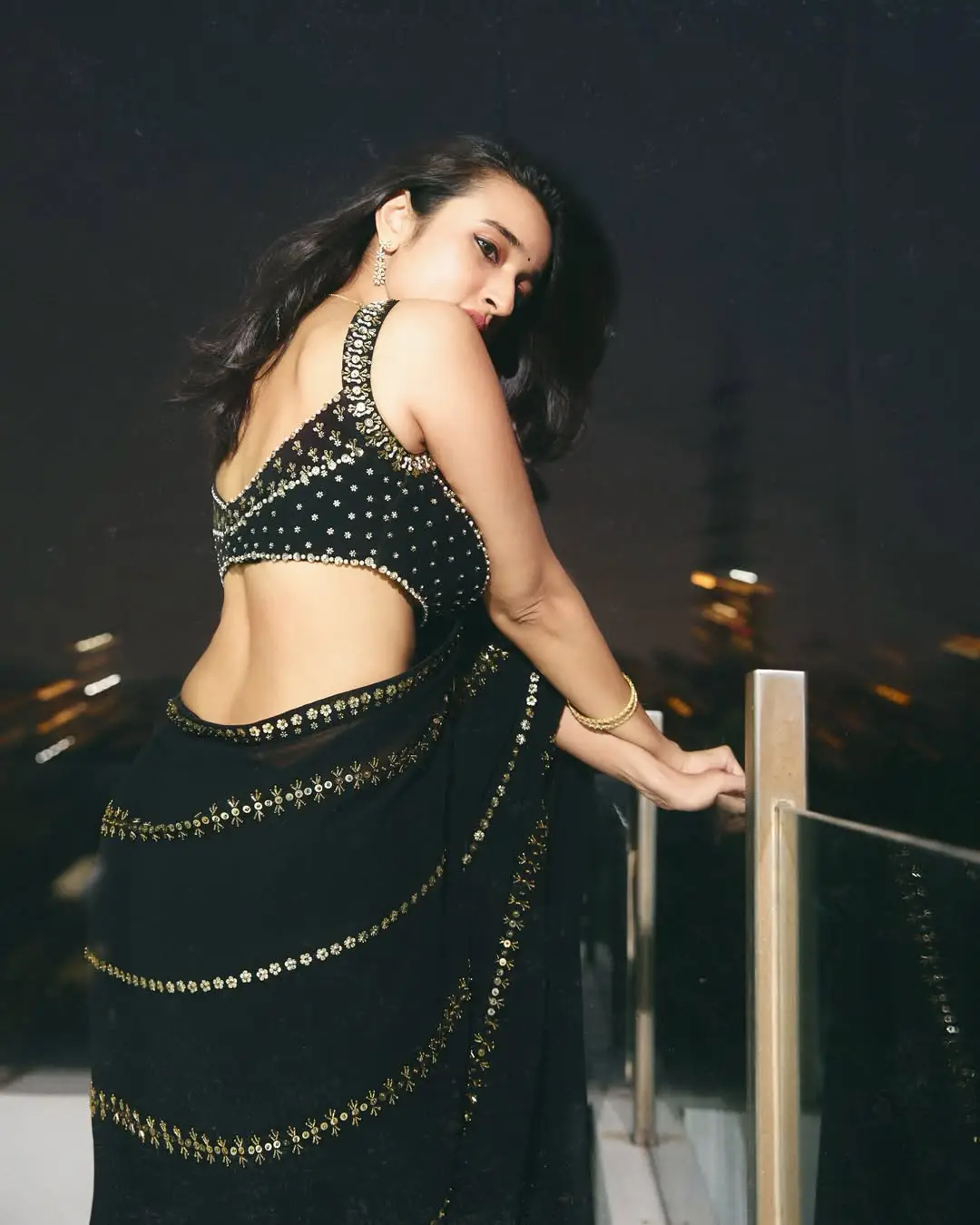 Nuveksha glamour show in a black saree