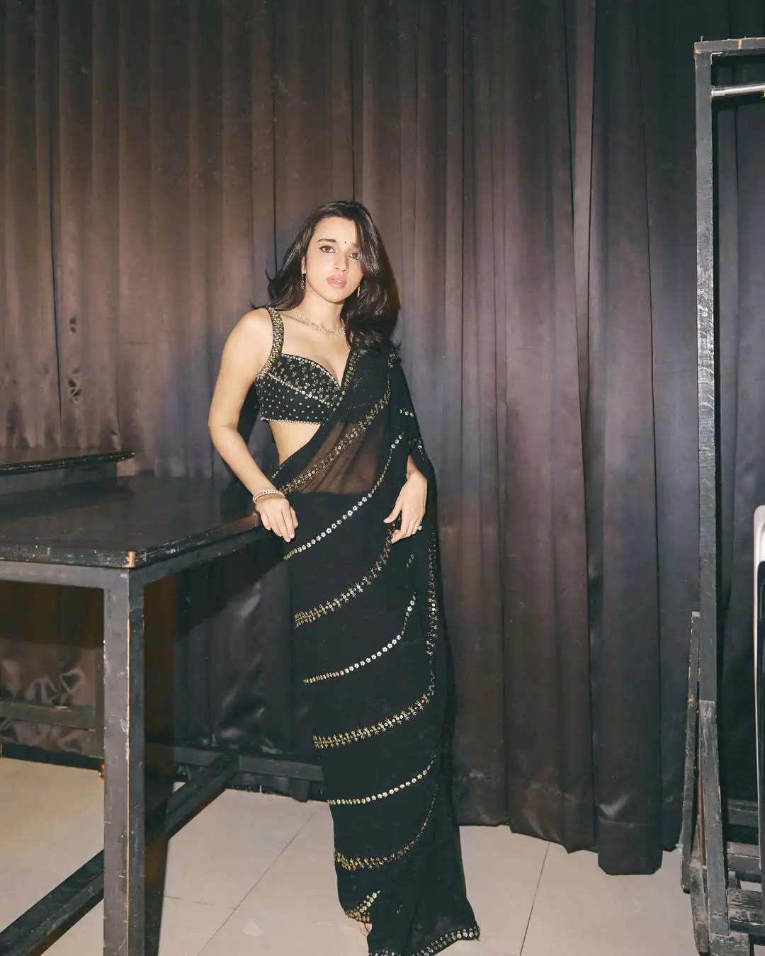 Nuveksha glamour show in a black saree