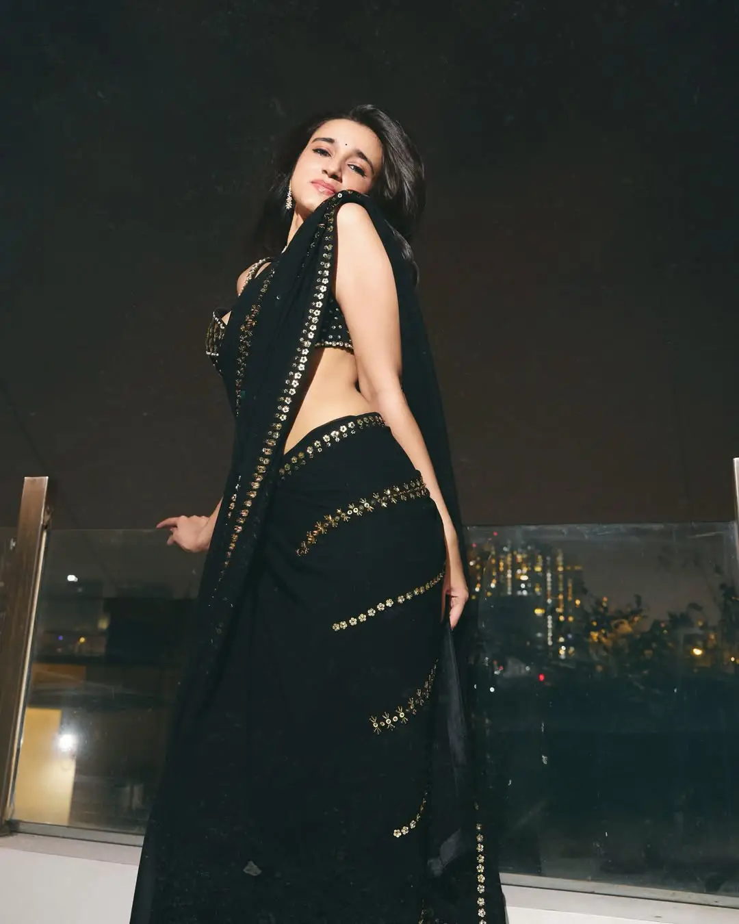 Nuveksha glamour show in a black saree