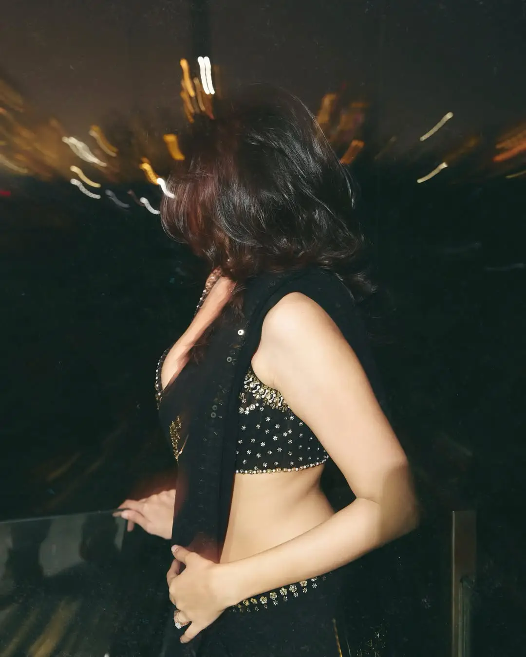 Nuveksha glamour show in a black saree