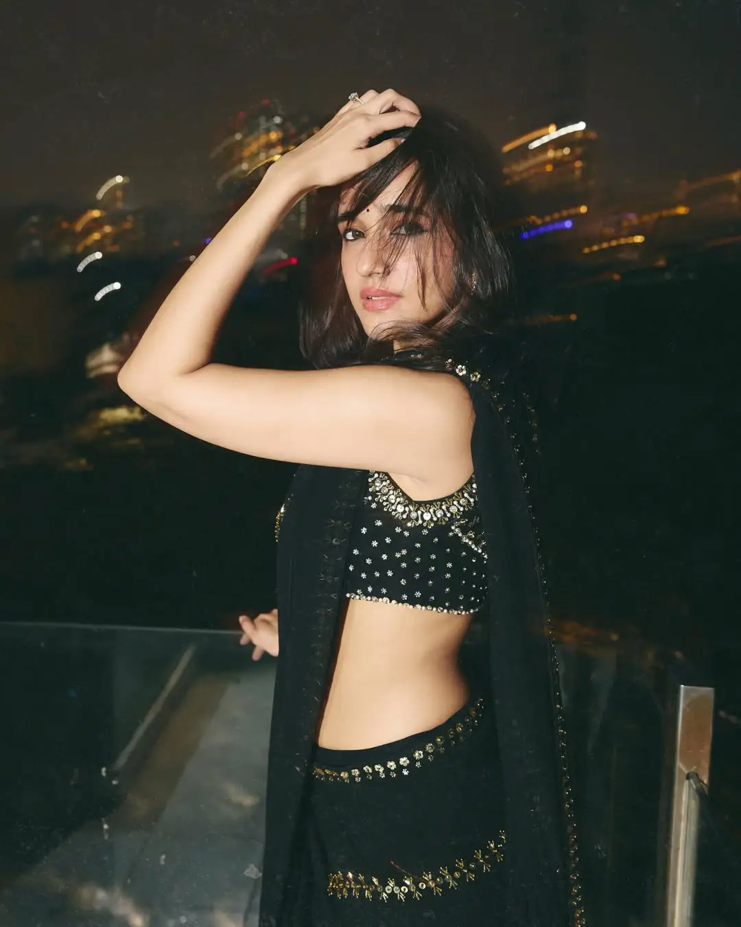 Nuveksha glamour show in a black saree