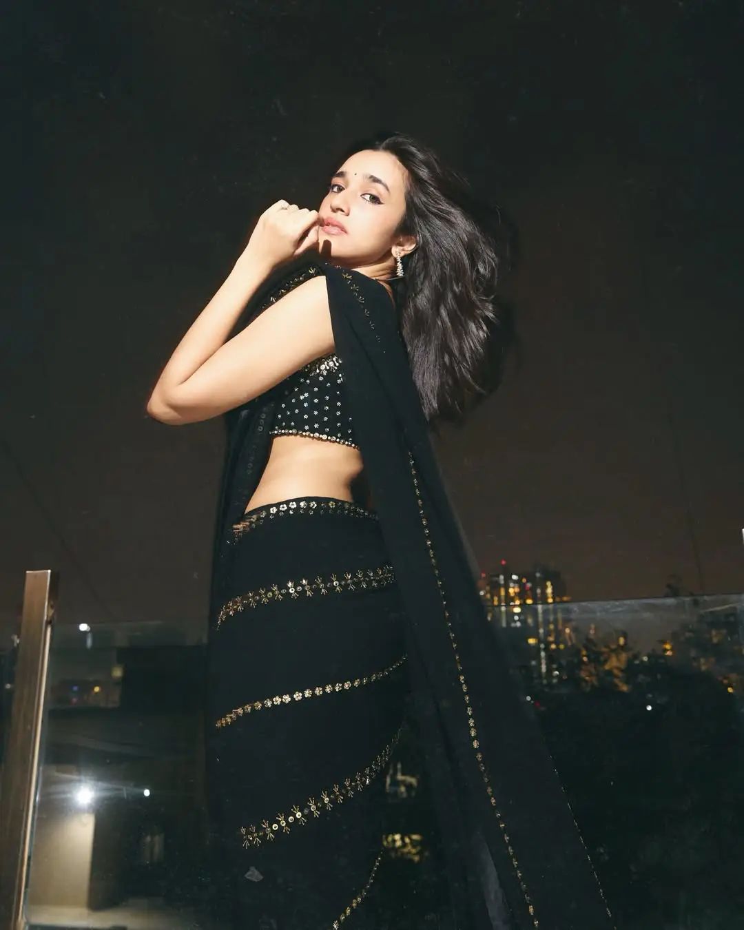 Nuveksha glamour show in a black saree