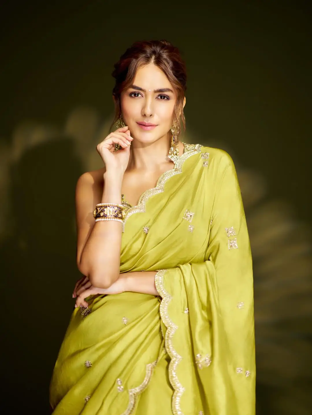 Mrunal Thakur looks stunning in a green saree
