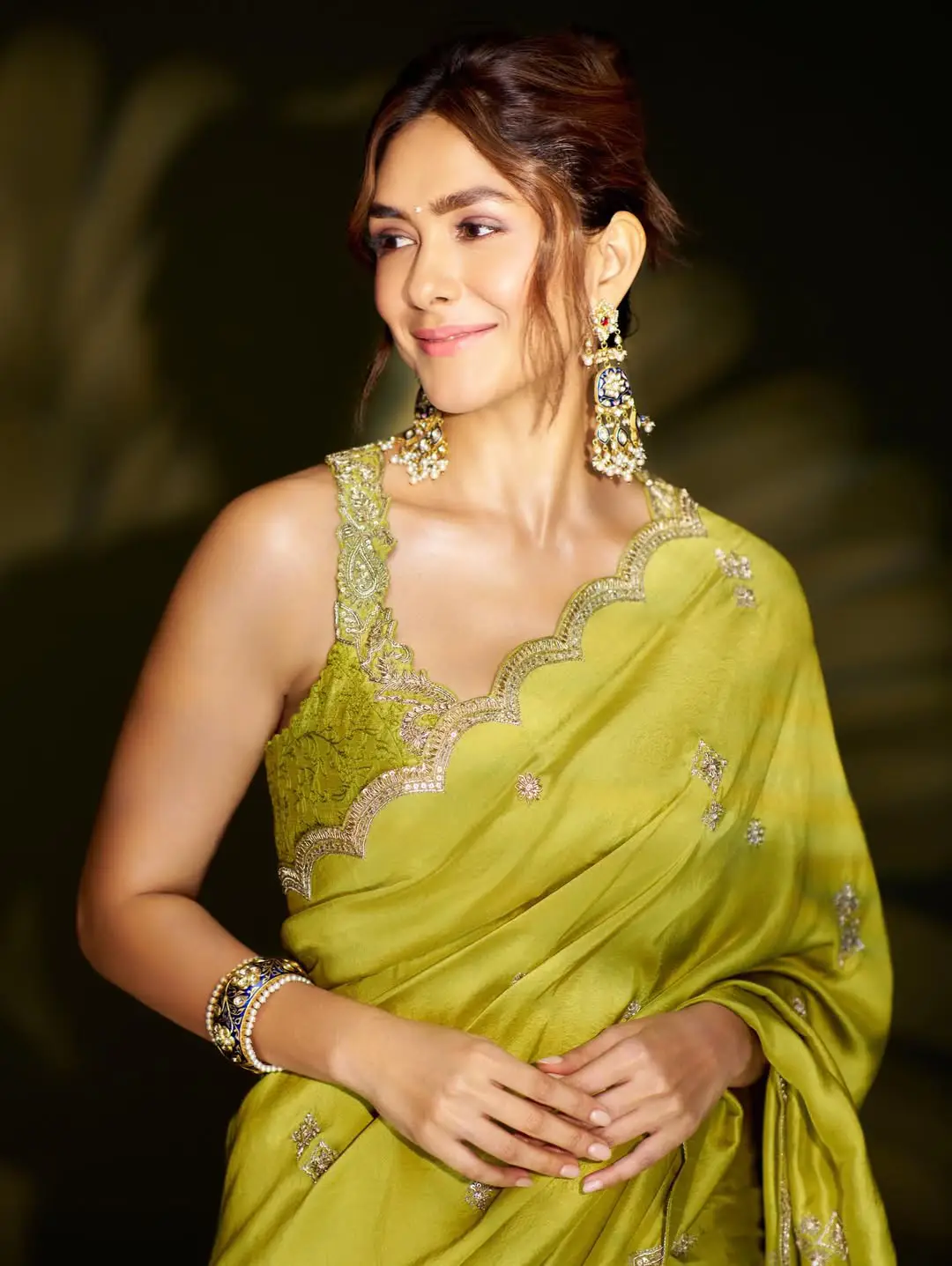 Mrunal Thakur looks stunning in a green saree