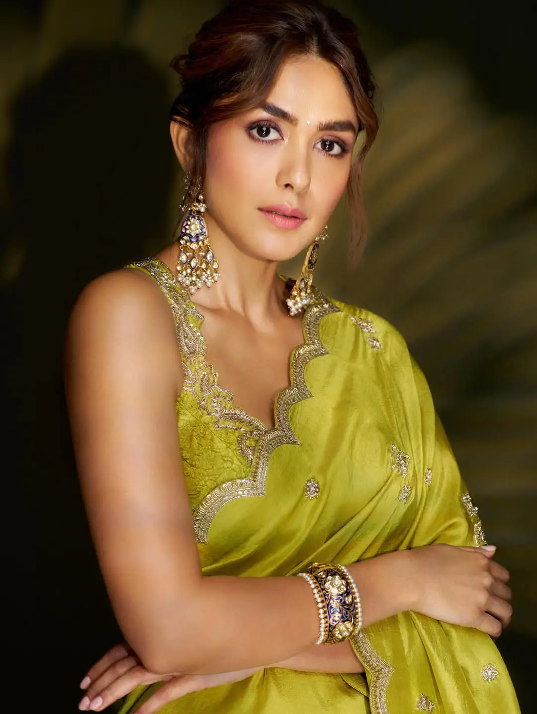 Mrunal Thakur looks stunning in a green saree