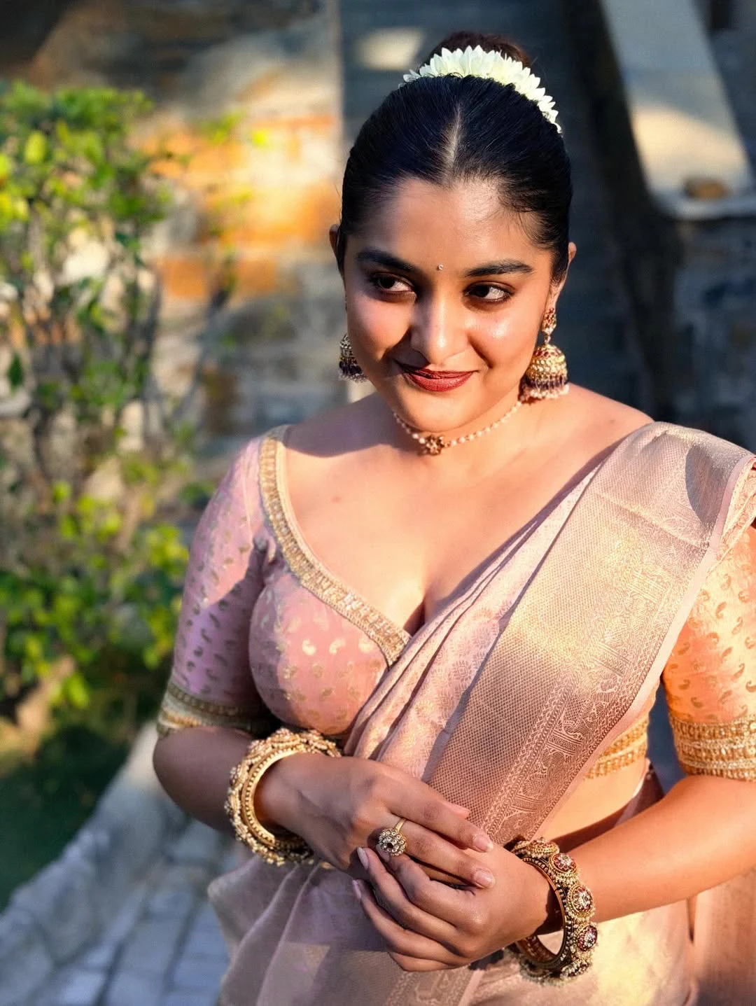 Nivetha Thomas Cute Photos in Saree