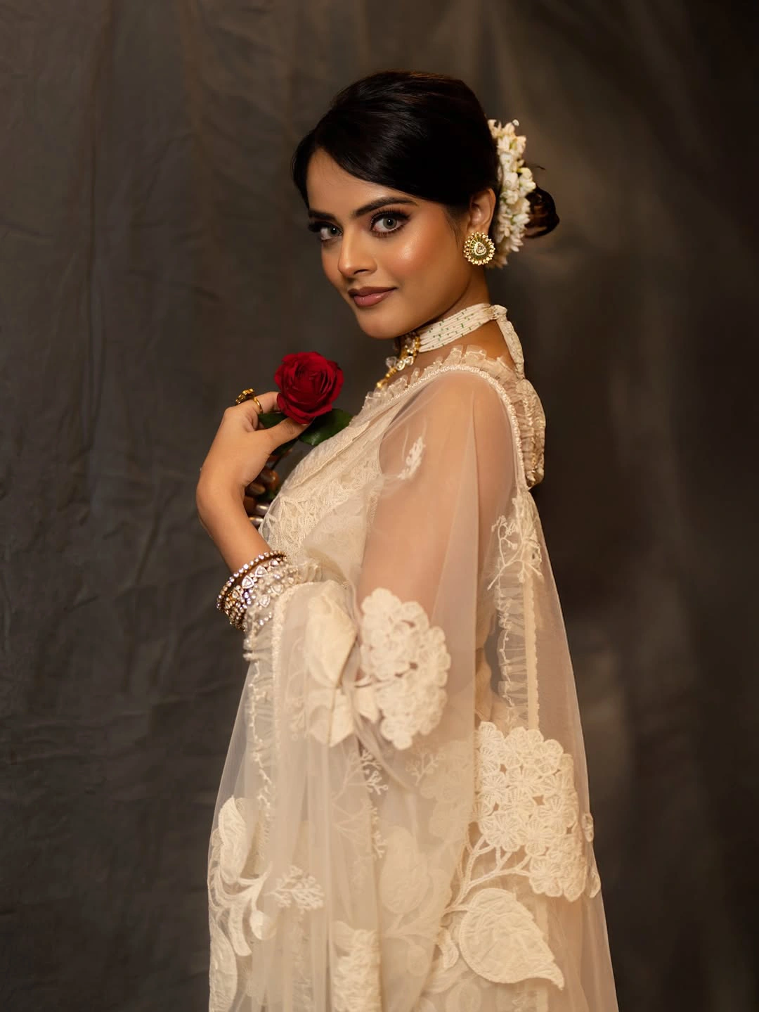 Riddhi Kumaar Stunning Looks in Prabhas Gifted White Saree