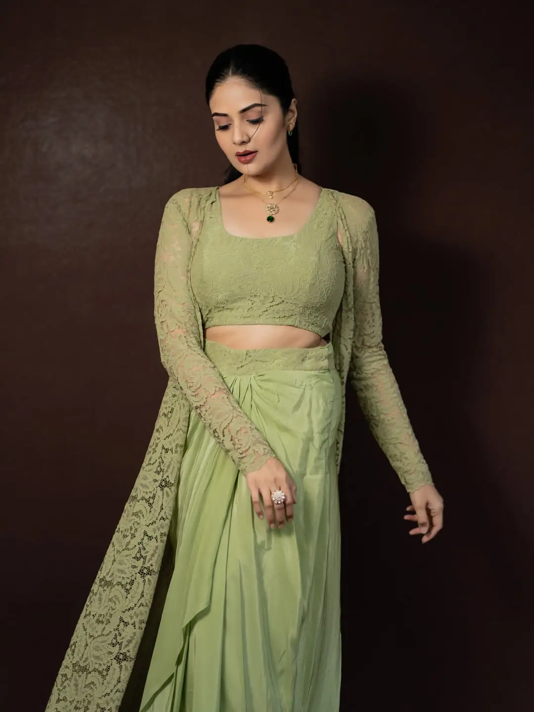 Sreemukhi glamorous show in a green dress. (1)
